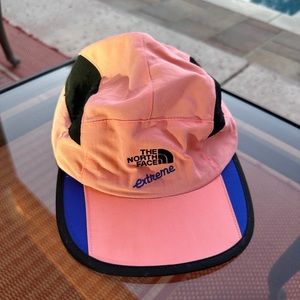 Nearly new, worn once or twice North Face Extreme pink and black 5 panel hat.